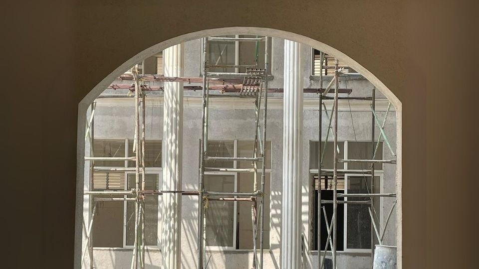Arched Window Framing Structural Columns & Scaffolding