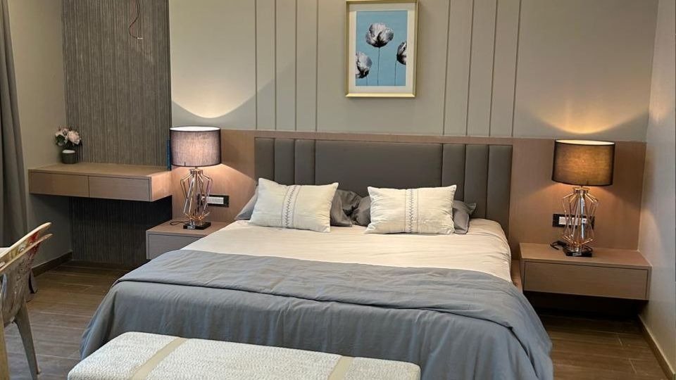 Luxury Master Bedroom Suite with Designer Lamps